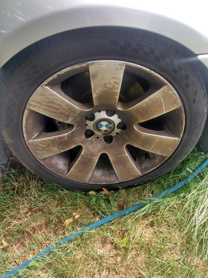Wheel caked in brake dust before detailing
